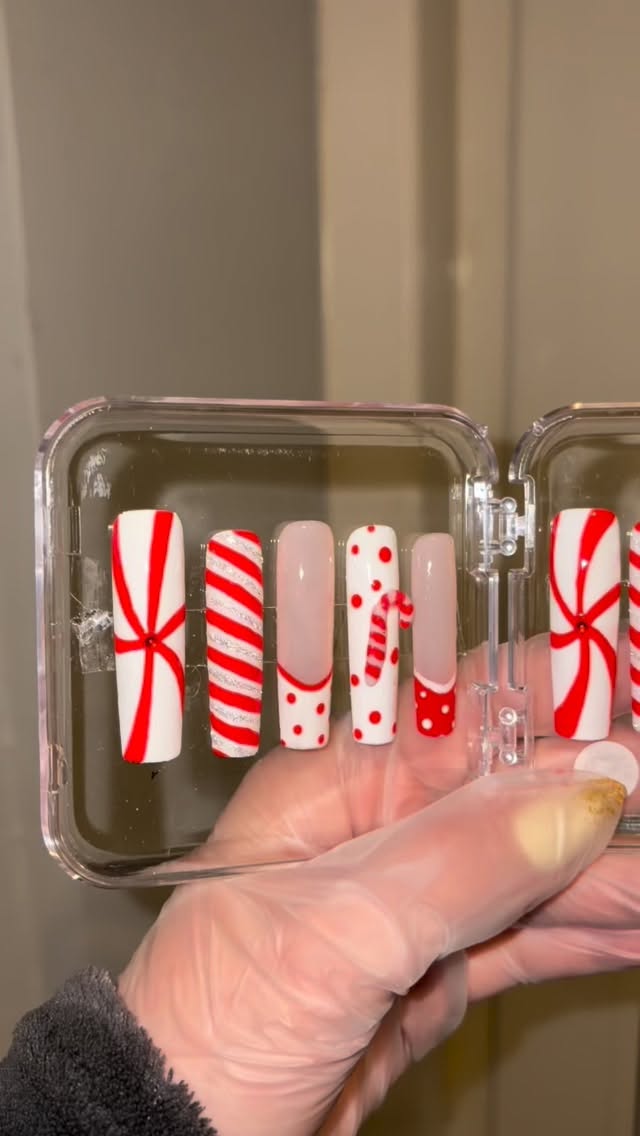 Here’s a sneak peek at our new Hand painted red and white candy cane Christmas press on nails with 3D candy canes! Will be available on our website soon #nailart #christmasnails #handpaintednails #nailsnailsnails #ChristmasGiftIdeas #CreativeNails #pressonnails #gelxnails