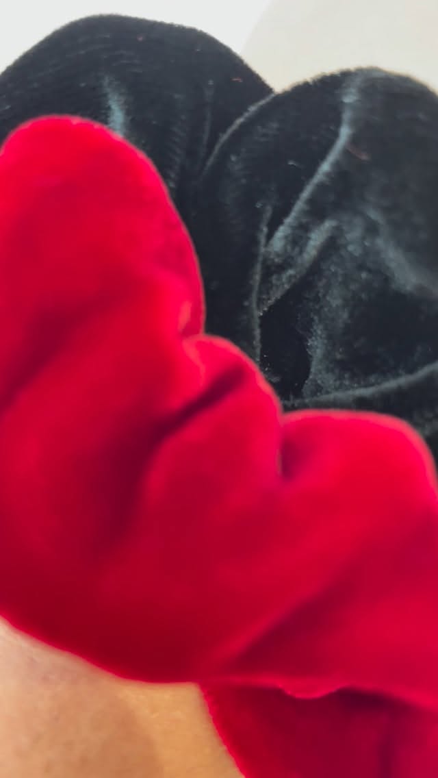 Silk velvet is finally here! I have been thinking of making these for literal years. I actually bought the silk backed velvet and sampled these months ago (I think July!) to make sure I had a better chance of launching these this year.
There are also matching velvet bows available with slightly adapted pleats to account for the thick plushness of the velvet!
Video description- zooming out on Jo’s wrist with two silk velvet scrunchies in black and red