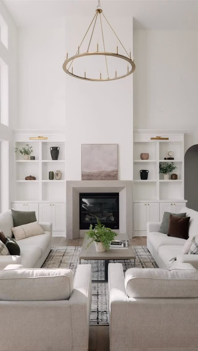 Light pours in, softens the edges, and settles into every corner of this room.
This is where mornings start slow, conversations linger, and evenings wind down under a quiet glow.
From the soaring ceilings to the layered textures, every detail was chosen with intention, not to impress, but to welcome. The built-ins frame moments, the fireplace anchors connection, and the open staircase quietly ties it all together. It’s a space designed not just to be seen, but to be lived in.
Because the most beautiful homes aren’t defined by trends, they’re defined by how they make you feel when you walk through the door.
#CustomHomeBuilder #ThoughtfulDesign #ModernClassicHome #TimelessInteriors
#LuxuryLiving #HomeDesignInspo #InteriorDetails #BuiltWithIntention
#ArchitecturalDesign #DesignThatFeelsLikeHome #NeutralHome
#ElevatedLiving #CraftedSpaces #OpenConceptLiving #highceilingdesign