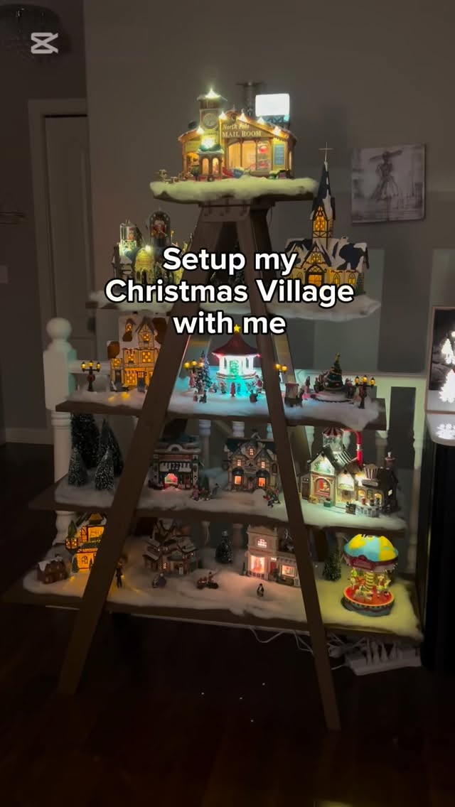 Christmas village setup! My dad made the shelves out of his old wooden ladder 🤗
#bookstagram #booksbooksbooks #christmas #christmasvillage #christmasvillages