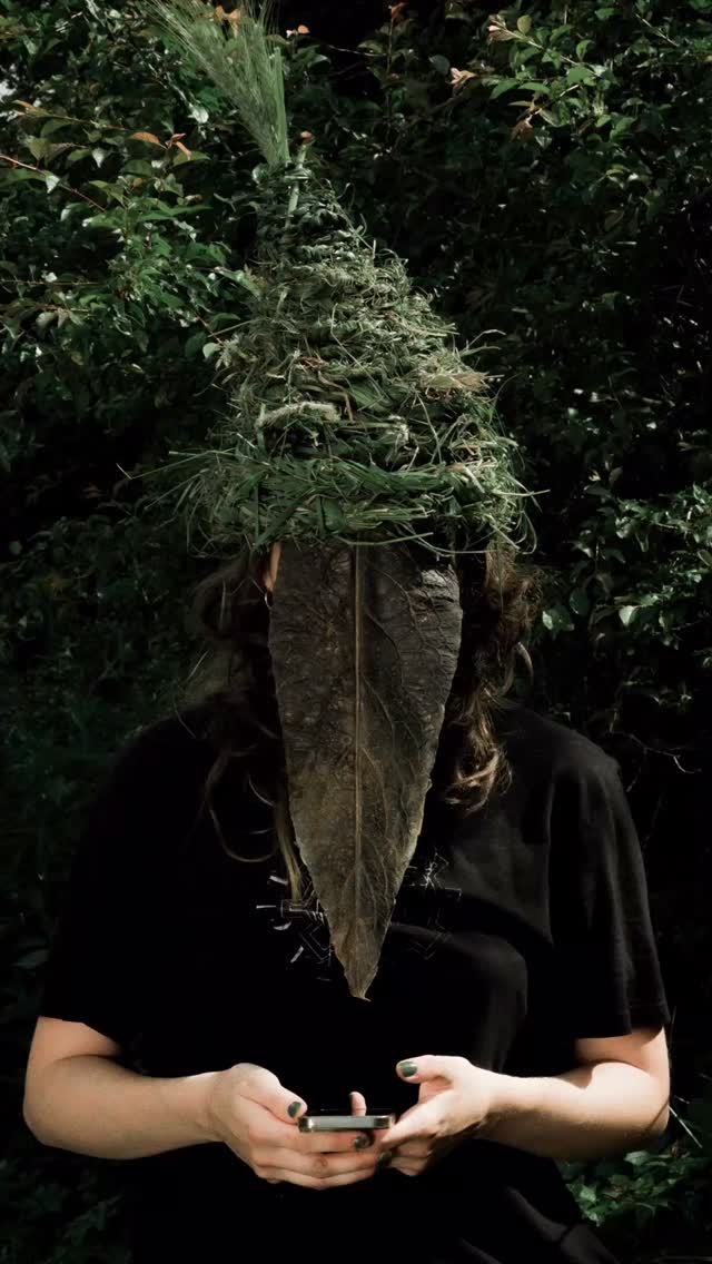 **Troll Project** 2024 during the Submicroresidence.
A performative, playful approach to the phenomenon of destructive influence from anonymity.
A game with humor, seriousness, and that human grumpiness that so often hides behind the screen.
Masks made of hay, earth, light. In some areas, people seem to blend into the natural background.
The smartphone as a link between nature and the network.
The troll laughs—and at the same time asks:
What remains of a person when the digital masks them? It was fun 📷 @ben_heinrichson