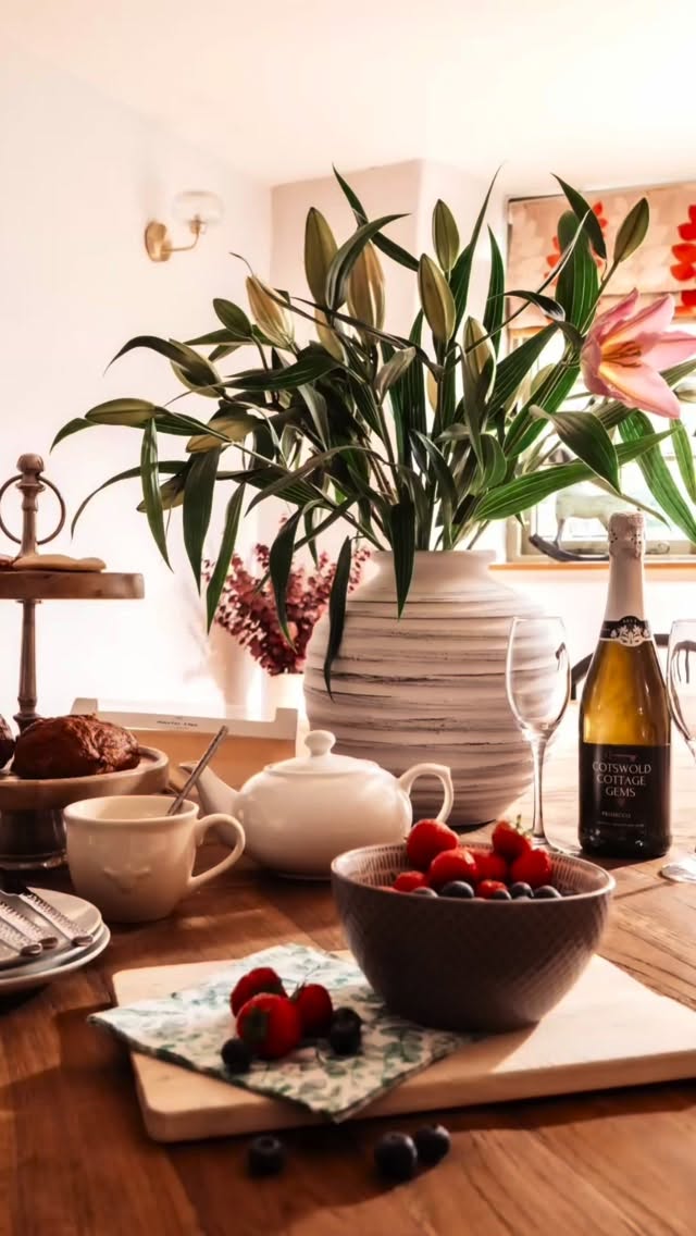 2026 is the year to explore the beauty of the Cotswolds.
In no particular order 25 excellent reasons to add this AONB to your travel list this year!
-Renting your own self catering cottage and owning your own slice of the Cotswolds for a weekend.
-Slow Sundays, things here feel more serene, more relaxed……enjoy that mid morning bubble bath followed by a fresh air ramble to the local pub.
-Daylesford Organic on the doorstep for super healthy shopping and wellness products.
-Almost everywhere is super dog friendly including shops, cafes and restaurants.
-Cottages with log burners…especially if you’re staying during the Winter.
-Bourton on the Water…..the novelty of paddling in the river Windrush never wears off.
-The Porch House pub in Stow on the Wold, one of the oldest pubs in England…..Stay in Rathbone Cottage across the road to make the most of exploring the high street.
-The best place to explore beautiful stately homes and gardens. My favourite is Bourton House in Bourton on the Hill.
-Feel transported back in time when you visit the original villages of Sarsden and Stanton.
-Pick your own wildflower display at Chippy Flower Farm on the edge of Chipping Norton.
-Go celebrity spotting at SoHo Farmhouse and The Falkland Arms in Great Tew.
-Indulge in one of the best Sunday roasts you’ll ever have at The Feathered Nest in Nether Westcote.
-Take the children to visit Adam Henson and his rare breed animals at The Cotswold Farm Park.
-Feel the electricity at Cheltenham races, whether you’re drinking, gambling or there to soak up the atmosphere it always promises to be a great day.
-Celebrate in style by requesting a private chef and bespoke decorations for your cottage to elevate any event.
-Get lost exploring the Great Red Wood Forest in Batsford Arboretum.
-Turn your hand to distilling and make your own full size bottle of Gin with the Woodbrothers in Bampton.
-Spend an evening laughing until your belly hurts at a comedy evening at Dunkertons in Andoversford.
-Join in with the annual Football match in the River at Bourton on the Water.
-Try a pint of Jeremy Clarkson’s beer at the Hawkstone Brewery.
-Take the whole family to Sudeley Castle Festival of Lights.