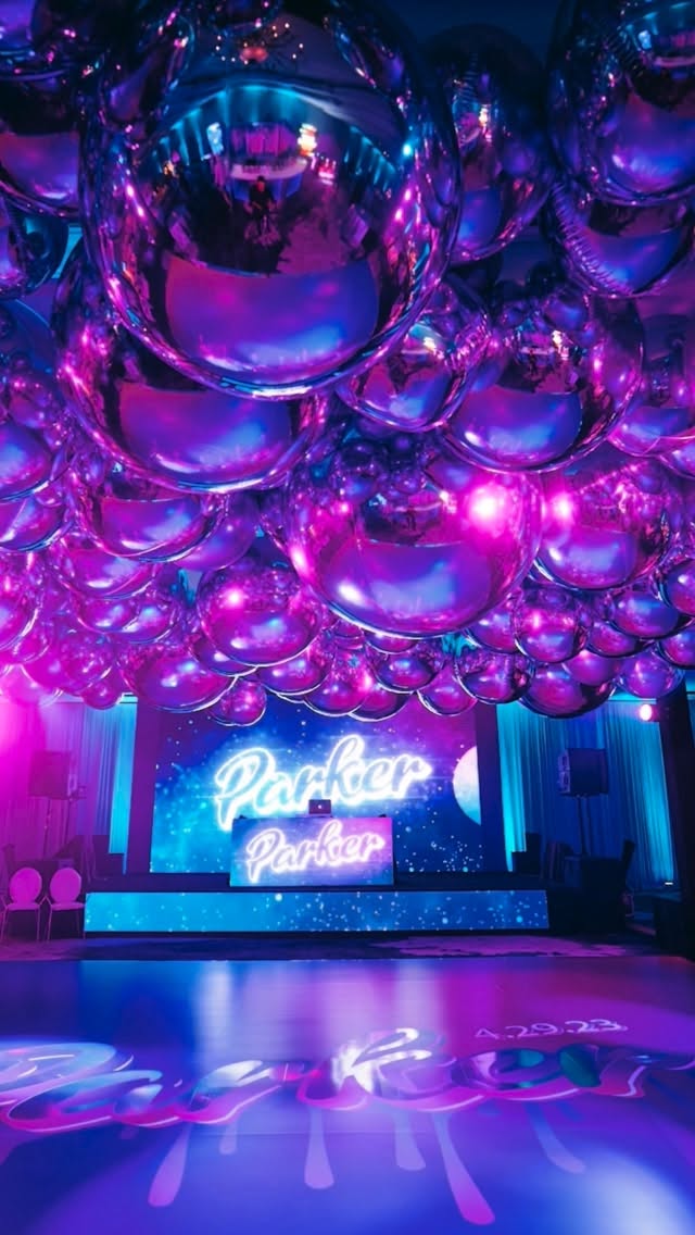 A sweet detail, done intentionally 🍧✨
We built custom popsicles to celebrate Parker’s love for all things fun and nostalgic, then layered the space with vibrant, colorful florals to elevate the ambiance and bring the tables to life. Playful, bold, and completely personal, because the best designs tell your story.
The stellar team 👇🏾brought this entire vision to life…
photo | @EliTurnerStudios
planning + design | @Magnolia_Bluebird
venue | @ritzcartltonwashingtondc
video | @monachettifilms
florals | @designsbyoochay
decor | @SyzygyEvents
ceiling installation | @partistryballoons
lighting | @digitallightning
arcade + photobooth | @snapentertainmentmd
screenprinting | @soulandinkcrew
rentals + linens | @nuagedesignsinc @bbjlatavola @partymosaic @tablemanners @perfectsettings @luxeeventrentals @somethingvintage
AV | @pm1pro
VJ | @badpedestrian
MC/DJ | @washingtontalent @victor_glyde_productions
drape | @fabeventsdc
logo, branding, invitations + print | @lepenndesigns
#batmizvah #mizvahdecor #washingtondcevent #ritzcarltonwashingtondc #floraldesign