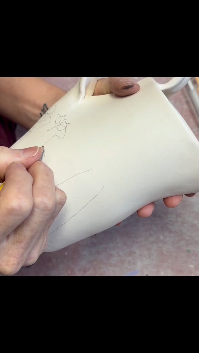 Underglaze painting a pitcher. #paintwithme #underglazepainting #ceramicart #catsofinstagram
