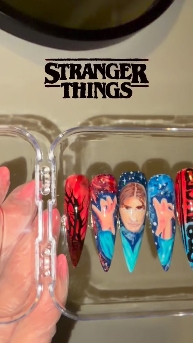 Hand Painted Stranger Things Press on Nails Part 1 - So I’ve finished the first part of the Stranger things set! I can’t wait to finish it 😊 the portraits are always difficult for me and the hands 😭😂 let me know how you think I did in the comments. Visit our store at www.nailartbyvicky.com or pm us for custom orders #nailart #StrangerThings #handpaintednails #nailsnailsnails #pressonnails