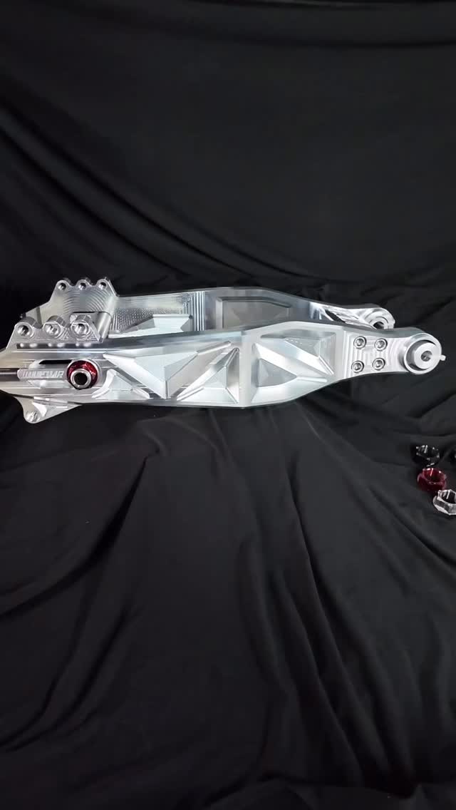 Once again, something completely different than the rest…. DMR Destroyer style swingarm for 09-up Harley Davidson touring models. CNC machined from a solid block of 6061 T-6 billet aluminum. Stainless hardware, hollow chromoly axle with titanium axle nuts (3 pvd coated colors to choose from) and titanium axle adjuster nuts. High quality spherical bearings with self centering spacers for pivot shaft. Tapered press fit center section with double dowel pins and 4 bolts on each side for a solid, no flex swingarm. Very strong, yet still lighter than stock. Axle adjuster plates have DMR logo on one side or flip over and adjustment marks on the other side. Tapered machined trellis pockets with stepped tooling lines and machine lines in the bottom of the pockets. Multiple shock locations to raise and lower bike. Front of swingarm has lots of clearance to allow for tall shocks. Provisions for race jack spools, sold separately (not on site yet). Works with stock brake caliper or we will be offering a radial caliper mount for 108mm bolt pattern calipers. We have 4 of these in stock and ready to ship!!! Proudly made in USA!! 🇺🇸🏁🇺🇸🏁🇺🇸