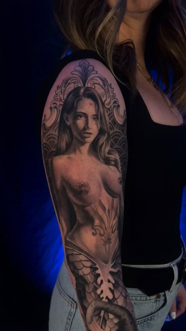 Don’t mind the zit on the forehead. Real life happened.
This piece was done a while back, I forgot to post it. Fun black and grey mermaid piece, fully healed.
a good example for anyone thinking about a mermaid tattoo.
Certain subjects need space to work properly and mermaids are high on that list. If you want the full figure, the flow, the tail, and all the details to read correctly, you can’t cram it into a tiny area.
This is roughly the size you need if you want a mermaid done right.
