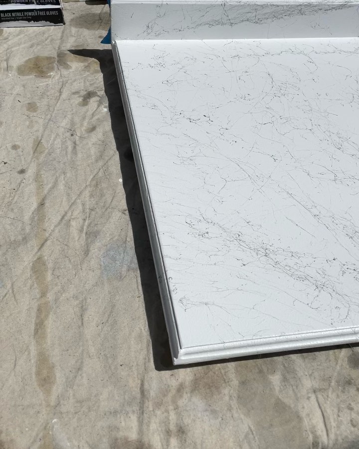 This was my first time using marble effect spray paint. What do you think? Does it look like real stone? That is just painted 3/4” plywood.
I did however have an issue with the clear coat on the first attempt at this counter. Happened to have the sunniest afternoon the day I was working on it and it caused drying problems with the clear coat. Had to sand it down, fill some cracks caused by the clear coat not leveling well bc the sun made it dry too fast. Set me back a couple of days as I had to sand, fill, sand, repaint sand and repaint and finally re did the marble effect. Hopefully tomorrow I can reattempt the clear coat in a more controlled environment. Fingers crossed it works better next time around!
#countertop #marbleeffect #spraypaint #skoolie #conversion #vanlife #mobilebarber