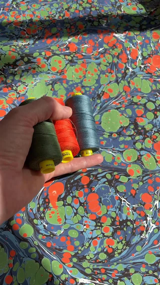 Selecting my endband threads to match my marbled endpapers! ❤️🔥