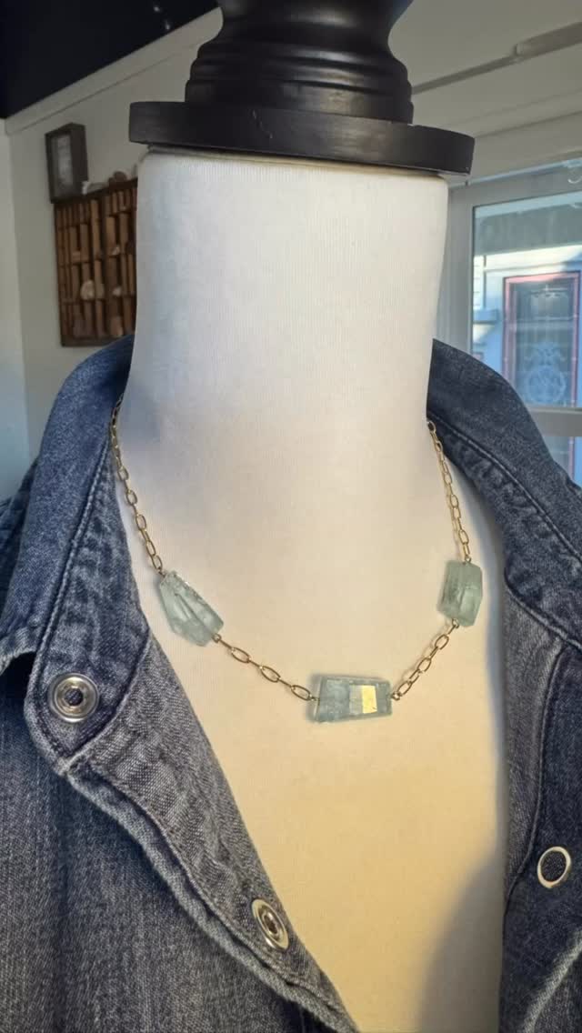 New stunning ✨aquamarine✨ stones that are cut beautifully and have a gem appearance that looks like it belongs in a ring.
This short 14 karat gold fill necklace on a paper clip chain features three of these stunning aquamarine with an adjustable length from 16 to 18 1/2 inches. This necklace is perfect for layering with other pieces you already own, or more from our collection.
Aquamarine’s calming energies reduce stress and quiet the mind. The lovely blue is correlated with the throat chakra, which acts as the body’s communication hub. It’s where you find your voice, speak your truth, and sing praises—for yourself and others. Not only is this chakra is associated with speaking up and expressing yourself, but also with hearing and being heard. The throat chakra is associated with truth, clarity, and responsibility. I can’t think of anyone who couldn’t use these traits right now.
#jewelrymadeinmilwaukee #handmadegifts #whattogetforasociallymindedperson
But if you’ve read this far and follow me (which you should), tell me: are we tired of the denim shirt yet?