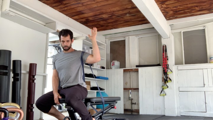 UPPER BODY WARMUP
Warming up should prepare the body for the workout ahead. This could include increasing range of motion, establishing alignment, stabilizing joints, or improving control of a muscle or a movement pattern.
Video 1: Posterior capsule mobilization. Let the band or strap pull posteriorly. I worked with @revolutionsinfitness to find this need of mine. Thoracic rotation, extension, and tissue length/quality were ok; posterior capsule was super locked up.
Video 2: Anti shoulder-rounding drill 1: I'm using isometric, eccentric, and concentric contractions. First find the position you want to be in, then try to pull yourself out of it. Don't let yourself move. This is an isometric contraction. Then pull yourself out of that position slowly for a few reps. You should fight the pull, but let the movement happen. This is an eccentric contraction, which is when the muscle produces force while it lengthens. Then pull yourself out of the position and then pull back in. This is a concentric contraction, or producing force while the muscle shortens. This progression is a neurologically friendly way to "find" and get control over a muscle or movement.
Video 3: Anti shoulder-rounding drill 2: Same as drill 1 but on the ground. Sometimes a regressed position helps because there's less for the brain to do. You can't fall over in child's pose. Other times the progressed position is easier: when the body has to use it's core and stabilize things, everything tends to turn on and self-organize.
Video 4: Anti shoulder-rounding drill 3: this one mimics the push-up I'm about to do in my workout. I'm trying to keep my shoulders in position while pushing my elbows away from one another. This helps set the scapula where they belong. Contrary to popular belief, they shouldn't pinch together. Instead, the scapula should sit flush on the ribcage, and the ribcage should "fill the space" between the scapula. The upper back should actually round a bit. I've got a weight between my shoulder blades to help me feel things. This one is rooted Dynamic Neuromuscular Stabilization methods and came courtesy of @chirofarm
