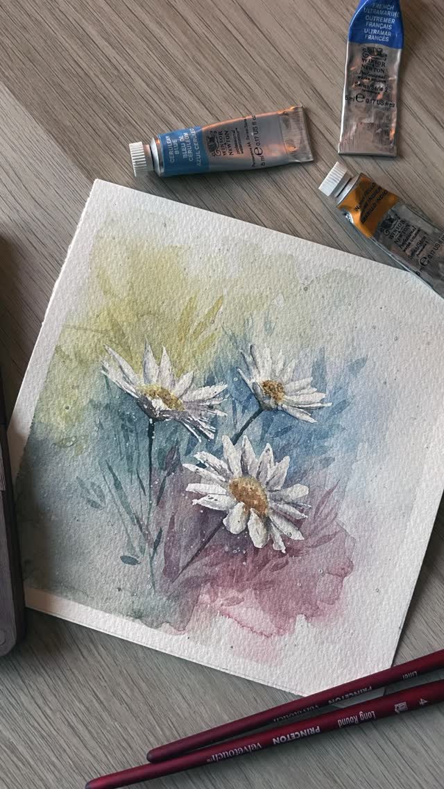 Daisies
.
A bright watercolour painting of daisies, bringing a little sunshine and cheer to even the greyest January days.
.
Happy Thursday all x
.
#watercolourart #daisypainting #paintingvideo #flowerpainting #floralart