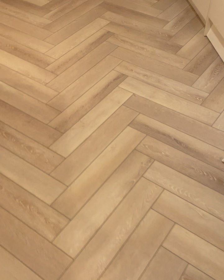 Vanilla oak LVT herringbone floor fitted recently in Caerphilly.