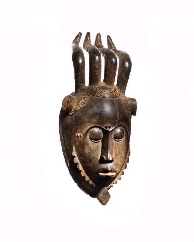 This ndoma baule mask reinterprets traditional ceremonial forms through a contemporary lens, presenting a calm yet commanding presence. Rooted in ancestral symbolism, the mask reflects identity, protection, and spiritual continuity, while its refined composition speaks to modern portraiture. Subtle details and balanced proportions invite prolonged viewing, allowing the face to feel both timeless and current. The work offers a quiet dialogue between past and present, honoring African heritage while asserting its place within contemporary art and design. > kingparisstudio.com