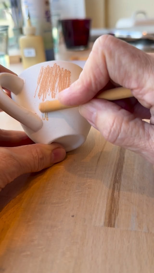 Painted with underglaze crayons.
Messy, soft,intentional.