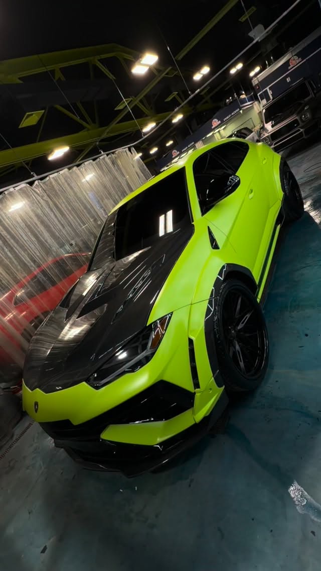 Urus fully customized on 24” @forgiato @wheels #lamborghini #urus #custom #widebody #carbon #green #layednotsprayed #paintisdead #carwrap #ppf #bodykit #nyc #cars #superbowl #nfl