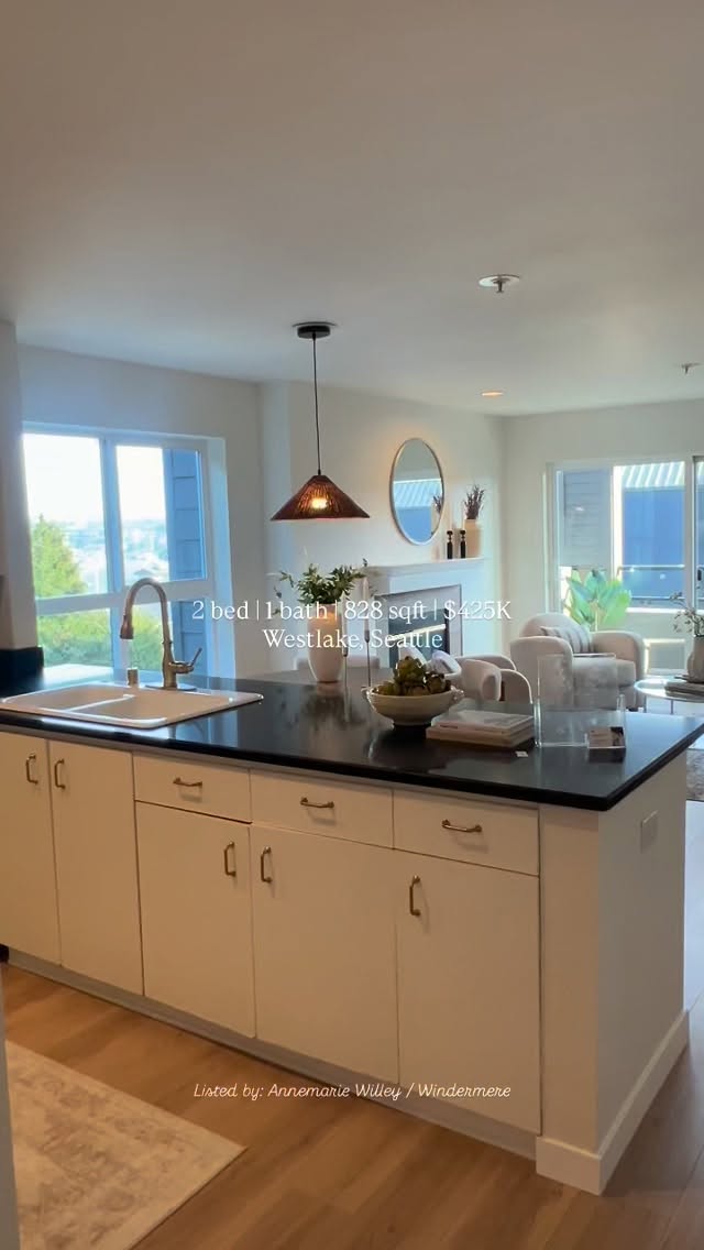 Beautifully updated Westlake view condo featuring new appliances, flooring, trim, paint, and hardware throughout. Light-filled living spaces showcase charming details and spacious bedrooms, with views of Lake Union and the Cascade Mountains from the kitchen and city skyline views from the private balcony. The kitchen is designed for comfortable everyday living and easy entertaining, complete with new stainless steel appliances including a double oven, multiple eating areas, and generous counter space. Unwind in the inviting living room by the cozy wood-burning fireplace. Two secure garage parking spaces, new laundry in unit and an additional storage unit add rare convenience. Residents enjoy access to a stunning rooftop deck with hot tub and panoramic city views, perfect for relaxing, entertaining, and taking in the Seattle skyline and Space Needle views. Ideally located near popular eateries, coffee shops, the Lake Union Loop, Meta offices, and with easy access to downtown. With a Walk Score of 84 and no rental cap, this home offers excellent flexibility as both an investment opportunity or a place to call home.
MLS # 2477396
Listed by: @annemariewilleyhomes
