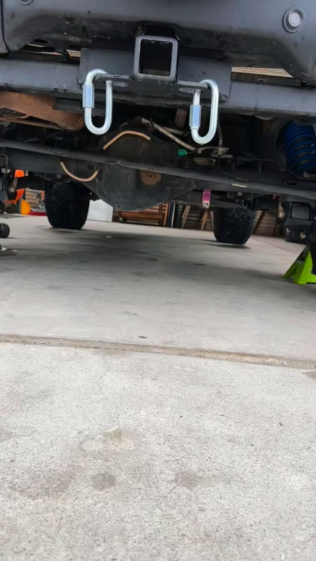 Rob’s 2022 Badlands Sasquatch is tracking straight again!
After a very nice upgrade to King shocks, the rear axle had shifted almost half an inch toward the driver side. Common when you lift or change rear suspension geometry. We installed an Icon adjustable track bar to recenter the axle, using a 2 inch Rhino USA retractable ratchet strap to pull the housing perfectly into place before locking the bar down. The pinch bolts and collar design made it easy to fine tune the length right on the vehicle, with no guesswork. Not only is it a functionally well engineered solution, the clean look of the bar with its axle side adjuster is a nice visual upgrade when you look under the back of the Bronco.
🔧 Products: @ivdsuspension 21+ Bronco Rear Adjustable Track Bar
📸 Mobile install and photos: Bear Paw Off-Road
🛠️ Tools: @rhinousa @milwaukeetool @pro_eagle
🐾 We come to you trailside or driveway.
#bearpawoffroad #mobilemechanic #bronco #sdbroncos #trailready