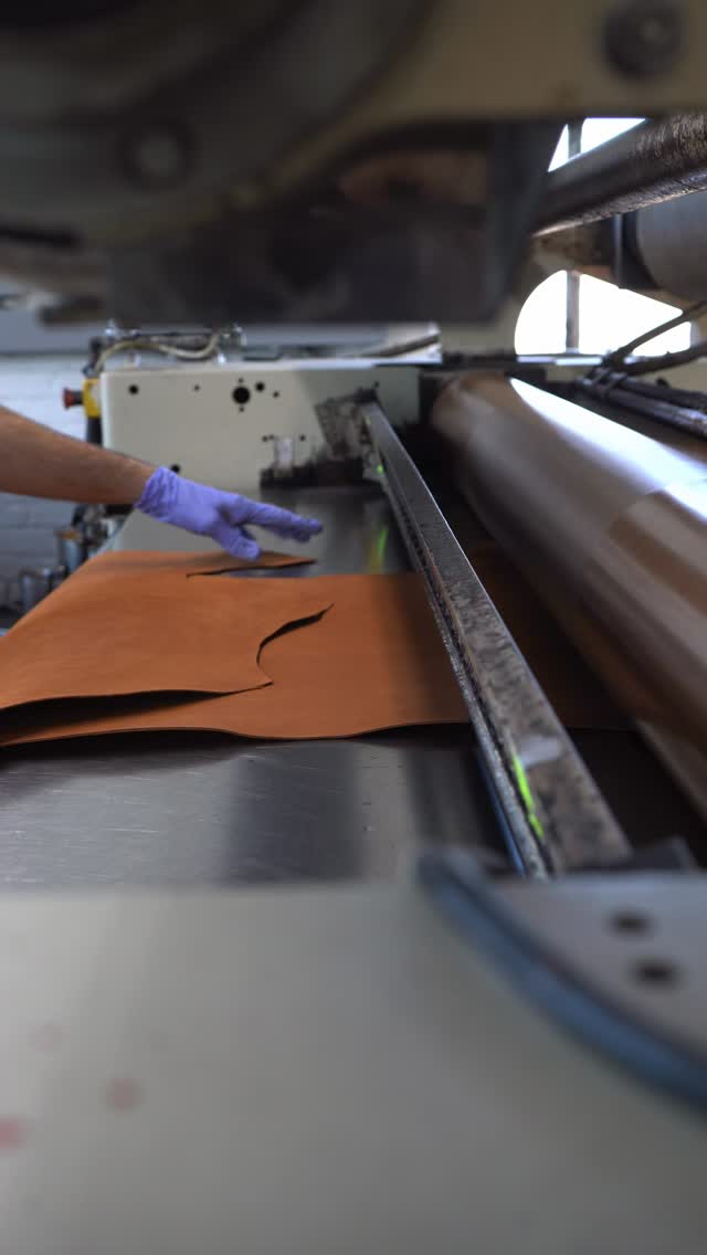 Russet hiker splits on the Roll coater. This operation adds a water resistant barrier to the surface! Roll coaters allow us to apply significantly more material than a conventional spray line. This allows for greater uniformly.
#madeinamerica #leather
