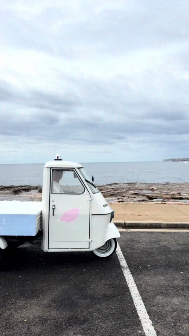 POV: It’s Valentine’s Day in the Eastern Suburbs and a vintage Italian three wheeler pulls up glowing 💋🚛
We turned our Piaggio Ape “Enzo” into The Glow Rider for a full street brand activation with Basics by B, cruising from Clovelly to Coogee stacked with ice cold clear canned drinks and lipsticks.
Fully branded cargo
Custom vinyl across the entire vehicle
Cold pressed juices in clear cans
Heads turning at every traffic light
This is how you launch a product in Sydney.
Mobile. Visual. Impossible to ignore.
If you saw us on the coast, you already know 👀
If you didn’t… imagine missing a glowing Italian icon gifting drinks on Valentine’s Day.
We create high impact mobile brand activations, custom branded carts, drink sampling campaigns and experiential marketing across Sydney and Melbourne.
Want your brand cruising the streets next?
Follow for more brand activations.
Save this for your next campaign idea.
Tag a brand that should be on the Glow Rider.
#BrandActivation #SydneyMarketing #eventplanner #EventMarketing #ProductLaunch