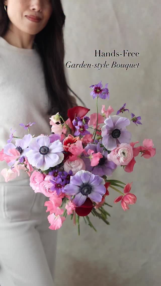 Hands-Free Garden-Style Bouquet
I used beautiful Canadian anemones with a pretty lavender color and long stems as the main flower for this bouquet 💐
Here’s how I created it using the StemSlider bouquet tool:
1. Started with filler flowers this time, spray asters, to build the base and fill the space.
2. Placed the main flowers, the anemones. Checked the height, width, and position using the StemSlider profiler.
3. Added the secondary flowers, tulips and calla lilies, in groupings. Then added ranunculus and check the overall balance of the bouquet.
4. Added sweet peas to create line and movement.
5. Lastly, added Leucocoryne to bring more softer movement.
6. Tied the stems and wrapped them with ribbon.
Flower materials:
– Spray asters (lavender)
– Anemones (lavender)
– Tulips (hot pink double)
– Mini calla lilies (burgundy)
– Sweet peas (pink)
– Ranunculus (light pink)
– Leucocoryne (lavender)
Flower tool:
- StemSlider bouquet tool (silver with a metal frog)
.
.
.
.
.
#stemslider #weddingbouquets #bridesbouquet #handsfree-bouquet #flowerbouquets