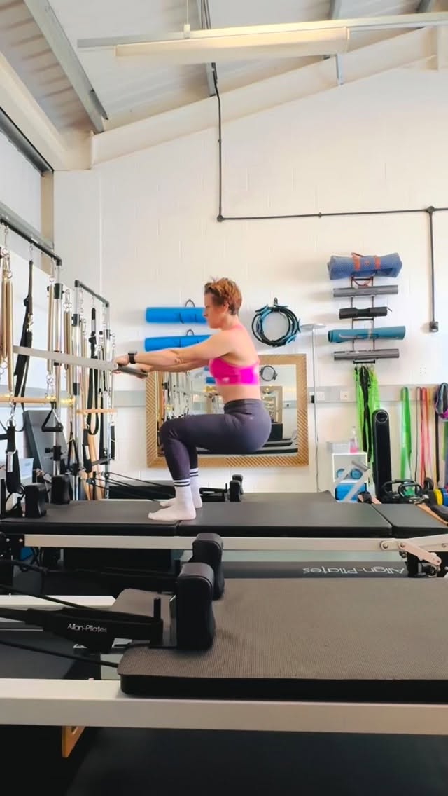 I get so many clients that come to me with bad knees. It could be so many different reasons they all say the same that they can’t squat, they have pain going up and downstairs believe me when I tell you I will get you to squat without pain. Once we have established Footwork in the Reformer we can move to footwork on the Pilates tower. It supports the whole body and allows with the correct form with no pressure on the knees but still allows you to get to that 90° angle. Here I’m using the push through bar with no springs attached. We can use springs to aid the movement, and this looks like a relatively easy exercise. I promise you you get a real burn from the standing Footwork. But no knee pain when form and support is correct. It helps to build really decent strength around the hips the glutes and support the knees. Remember with the right guidance, the right knowledge, and understanding bodies movement patterns you can overcome and support most movements. This is the whole emphasis of Pilates and the large Pilates equipment such as the reformer. Let’s build the foundational strength before we add on. #pilates #pilatestower #squat #rehab #strengthforlife