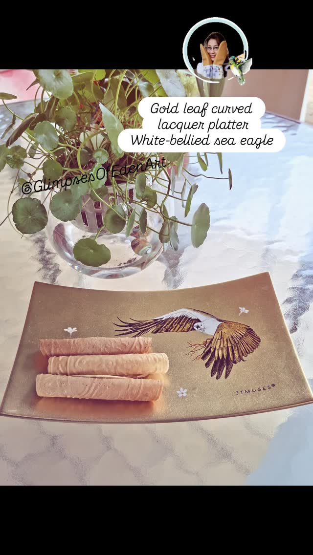 Can you identify Singapore's largest bird of prey? It's featured on our $500 note! Handmade in Vietnam, our gold leaf curved platter is now available for pre-order. DM me for orders! #glimpsesofedenart #jtmuses #sglocal #sgheritage #artwithpurpose