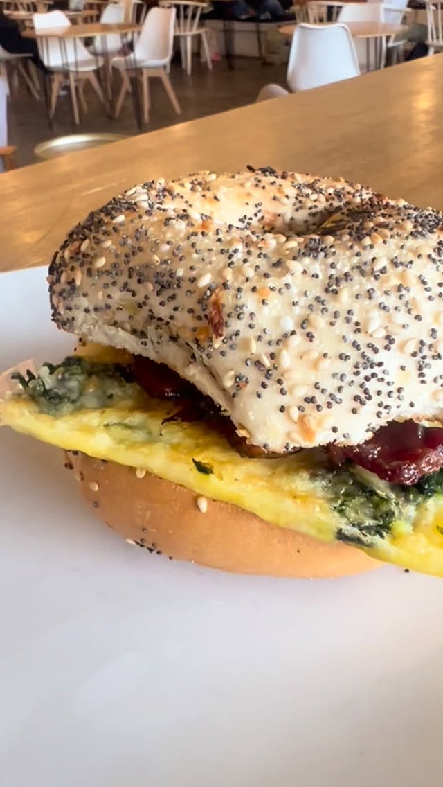 NEW DROP 🚨 BAGEL SANDWICHES! Cheddar and spinach egg, crispy bacon, and garlic herb cream cheese on a toasted bagel flavor of your choice. 🥯🥯🥯 Starting tomorrow!