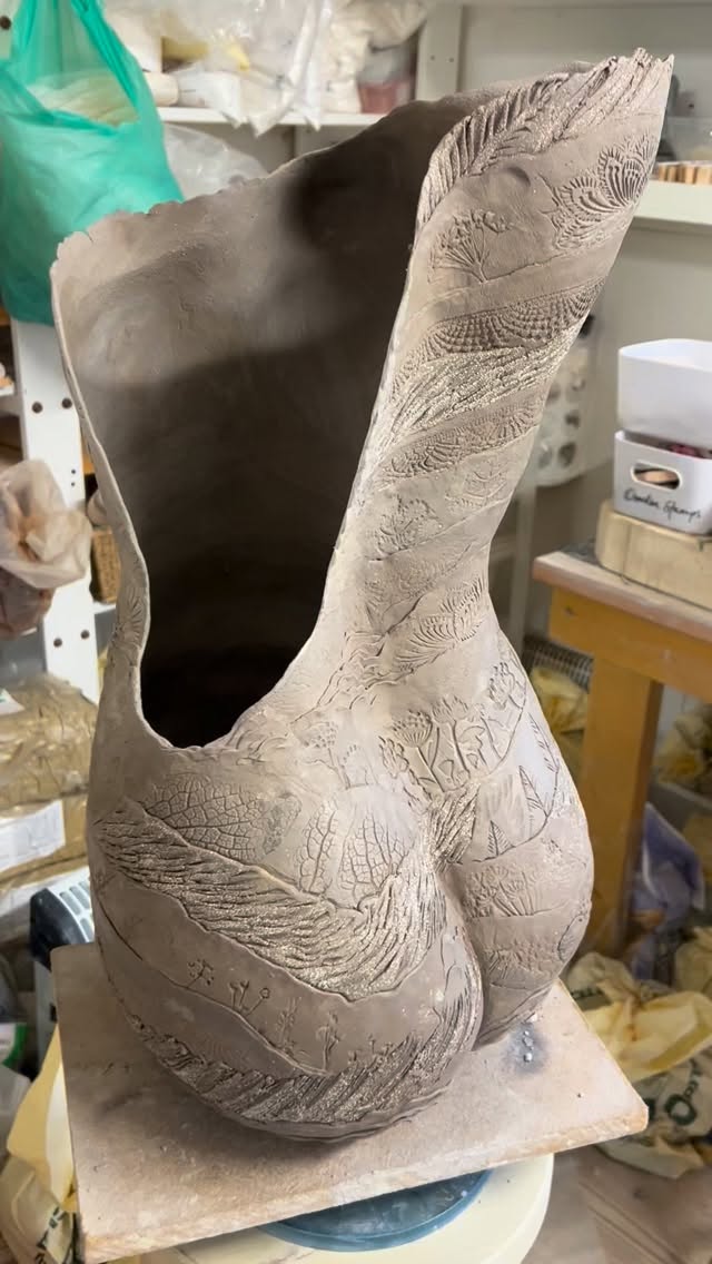 I’ve enjoyed making this clay piece over the last couple of weeks. For some reason it’s been a challenging piece to make, but there are some new textures and techniques that I have been using which I hope will trickle into more of my work. More texture, new imprints a gentle development.
I made this one so big that I only just managed to get it into the kiln. My measuring stick now has a more sensible measure added to it which will suggest not to push things within millimetres of the ceiling of the kiln. Honestly, you think I would’ve learned that by now!! Sigh!
I have a challenge of making four large pieces within the next month! Sometimes it’s good to have a challenge! So here goes! Let’s hope we don’t have any explosions on as an exciting challenges happening!!
#sculpture #ceramicstudio #ceramicsofinstagram #claybuilding