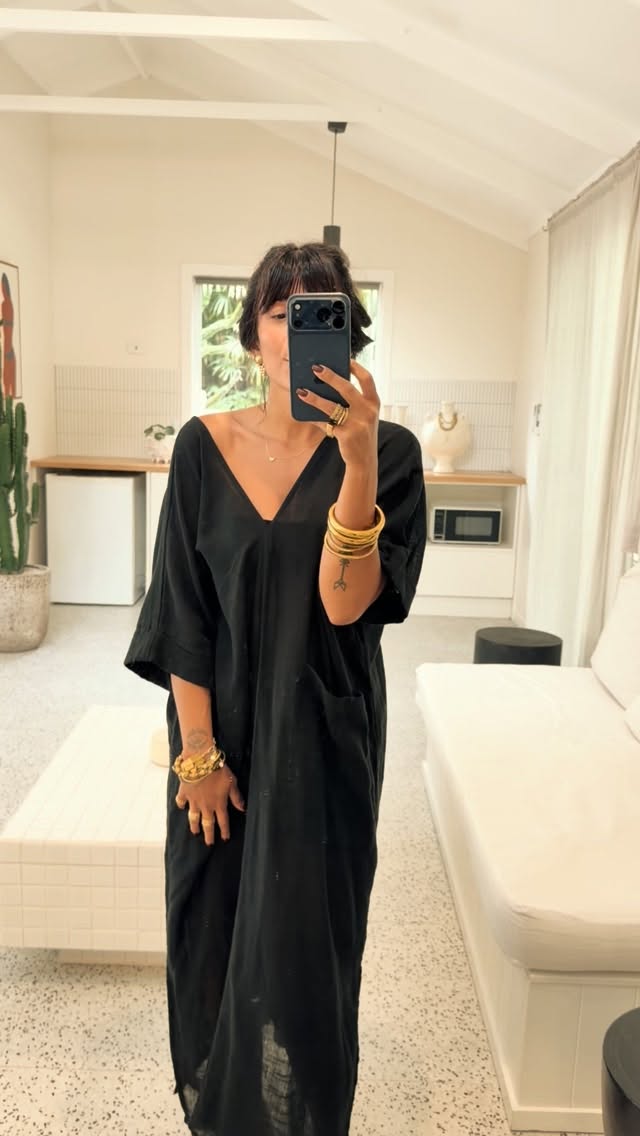 There are pieces we wear…
and there are pieces we become.
This limited edition of Organic Cotton Kaftans was created for the in-between moments — slow mornings with bare feet on cool floors, long lunches that turn into sunset gatherings, travel days where elegance must feel effortless.
For the woman standing in the mirror at home — sunlight on her shoulder, gold resting against her skin, completely herself.
This collection was born in those moments.
Just the garments I truly live in.
Nero is the one I reach for when I want to feel grounded. Strong. Undone but refined. Gold against black. Skin against cotton.
Naturally dyed. Fluid. One generous silhouette.
If you see yourself in her… you already understand.
#chandracollections #quietluxury #organiccoton #bohemianwoman #ancientmodern