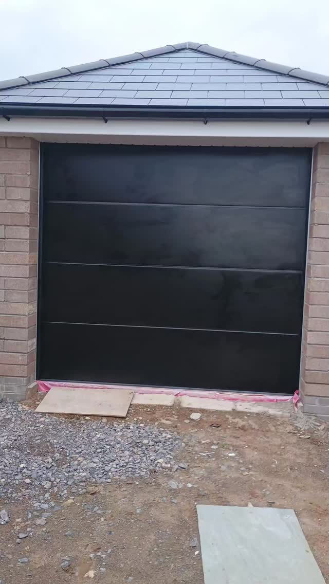 Real nice.
Ebony black smooth finish in a large design.
Fully insulated sectional door.
Remote control with auto locking and auto stop on impact.fitted in rhoose.
If this is something you are interested in please get in touch we would love to hear from you.