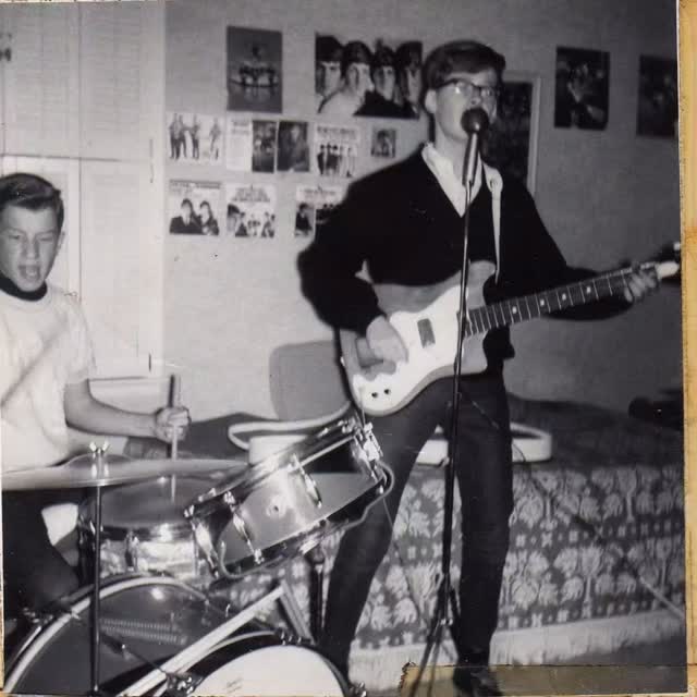 HAPPY ETERNAL BIRTHDAY TO MY BESTIE... THE ONE AND ONLY BILLY SPEER (circa 1964) A.I. is good for a few good things.... (thanks Chuck Schmitt)….I feel 62 years younger watching this depiction of the energy in my Leawood bedroom... Bill’s skinny jeans and Airline guitar as the foundation of that Buddy Holly look and the baby blue KU Basketball sweatshirt I’m wearing says it all.... (not to mention the posters and albums that I stapled to the walls). What a great time to be alive... then, and now; still fed by the deep bond of our mutual love for Jesus.... “Cht….” #happybirthday #childhoodbesties