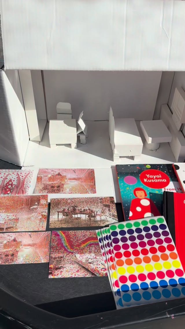 Inviting Children to Explore Yayoi Kusama’s Obliteration// As part of exploring influential women in art, we introduced the children to #YayoiKusama, a groundbreaking artist known around the world for her bold use of color, repetition, & her iconic polka dots. Kusama has spent decades creating immersive installations, paintings, & sculptures that transform everyday spaces into vibrant works of art. Her work often explores the idea that small repeated elements like dots can grow & spread until they completely transform an object or environment.
One of her most famous interactive installations is The #obliterationroom. In this installation, an entirely white room filled with white furniture is slowly covered with colorful dot stickers by visitors. Over time, the once blank space becomes completely “obliterated” with dots, turning the room into a collaborative & ever-changing artwork. The installation invites people of all ages to participate & become part of the creative process.
Inspired by this idea, we invited the children to create their own miniature version of Kusama’s concept. We began by providing 3-D box structures made from recycled packaging materials, which were spray painted white to resemble the blank space of the room. The children were then invited to transform the boxes by placing colorful dot stickers all over them. As they worked, the simple white boxes slowly became vibrant & playful sculptures filled with pattern & color.
This experience supports many important developmental skills. Placing small stickers strengthens fine motor control & hand-eye coordination, while repeating dots encourages pattern recognition & early mathematical thinking. Working with recycled materials also introduces children to creative reuse, showing them that everyday objects can be transformed into art. Most importantly, this type of open-ended experience encourages children to experiment, collaborate, & see themselves as active participants in the creative process, just like visitors contributing to Kusama’s Obliteration Room. #tinkerwonderplay #arteducationmatters #preschoolart