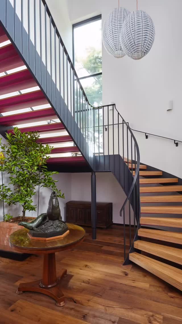 Designed by MODH, crafted with precision by @dmrengineeringiw in their workshop, then brought to site and installed.
A staircase designed not just to connect levels, but to elevate the space, paired with a tall vertical window that draws light deep into the interior, creating a considered moment in the home.