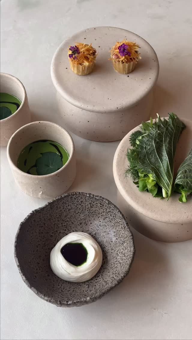 @jamesotwilson walks us through the new tasting snacks at Moda.
Beef tartare croustade with smoked emulsion, wild garlic capers, shallots and chives, finished with shoestring potato.
A wild herb “taco” of shiso, sorrel, wild fennel, chickweed and Alexander’s hearts, seasoned with plum blossom vinegar, topped with fried nettles and tarragon emulsion, served with almond cream cheese and tarragon oil for dipping.
And a light nettle and potato soup, finished with nasturtium oil.