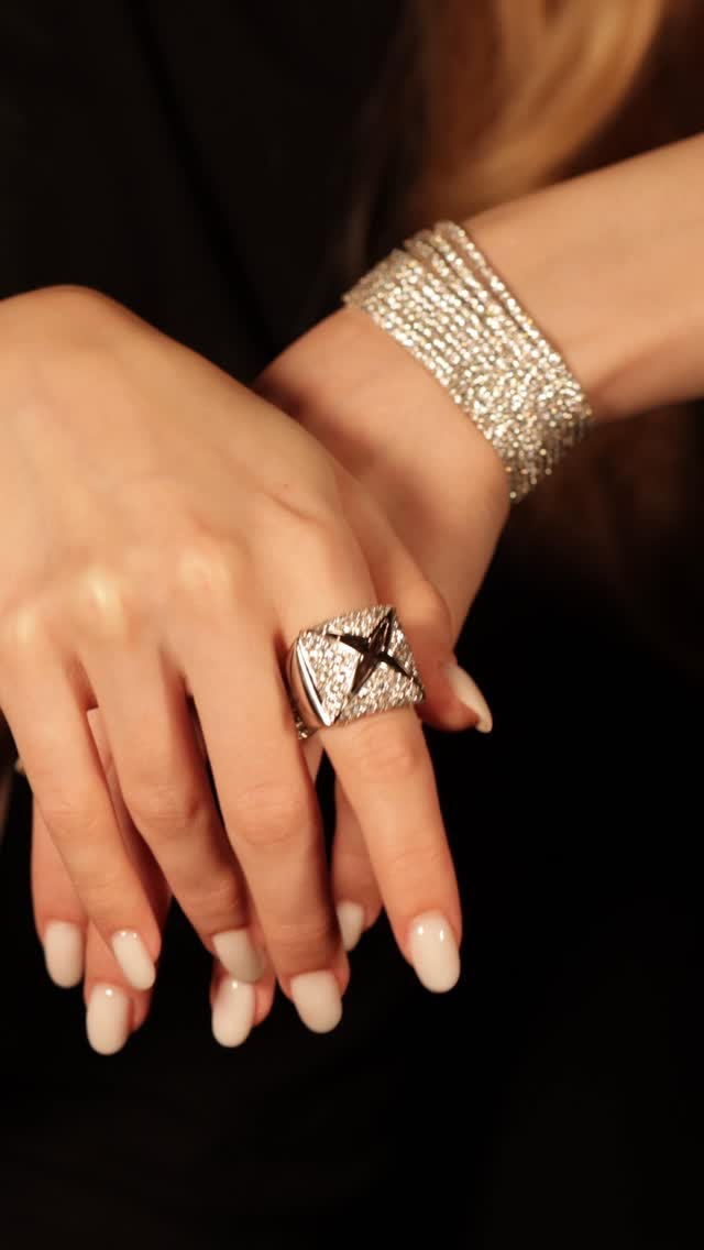 1’365 diamonds on the wrist. 229 on the finger. At some point the number stops being a number and becomes something you feel.
To set 1’365 diamonds across a single bracelet requires a precision that cannot be rushed and cannot be corrected once each stone is seated. Every single diamond is held in place by four individually hand-raised prongs, tiny claws formed from the gold itself, shaped by hand around each stone one by one. That is 5’460 prongs on a single bracelet. Each one raised, shaped and checked individually before the next stone is seated beside it. The result is a surface that does not read as individual stones at all. It reads as light. Continuous, uninterrupted, moving with the wrist as though the bracelet itself is alive. 19.85 carats in F-SI quality. 103 grams of white gold.
On the hand, a ring carrying 229 brilliant-cut diamonds in F-VS totalling 3.58 carats, 20.60 grams of white gold set so completely that the gold underneath becomes almost invisible. And beside it, a ring built around a single teardrop diamond in F-VS at 0.42 carats, framed by 52 brilliant-cut stones in G-SI at 0.55 carats. 5.30 grams. The quietest piece in the image, and the one the eye returns to last.
1’647 diamonds in total. Three pieces. One metal. Everything white gold.
By private appointment only.
The BrandZ — A Luxury Experience.
#thebrandz #diamonds