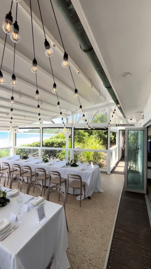 Festoon light set up for a wedding reception at Beach Byron Bay π