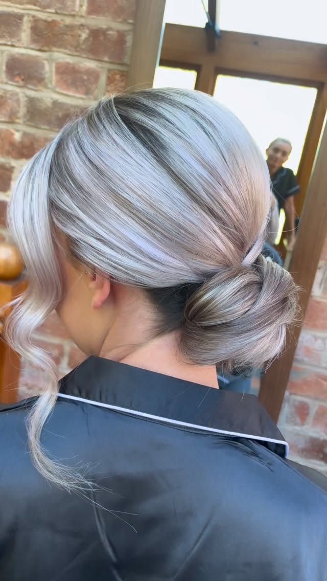 BTS with our gorgeous bride Emily at @thewoodlands.hothorpe
Emily has set a trend with her choice of bouncy blow dry curls with sides back and lifted. Flawless bridal glam make up by @sjs__bridal
Her stunning dress with bow detail next to her chic looking bridesmaids in black in their each unique style.