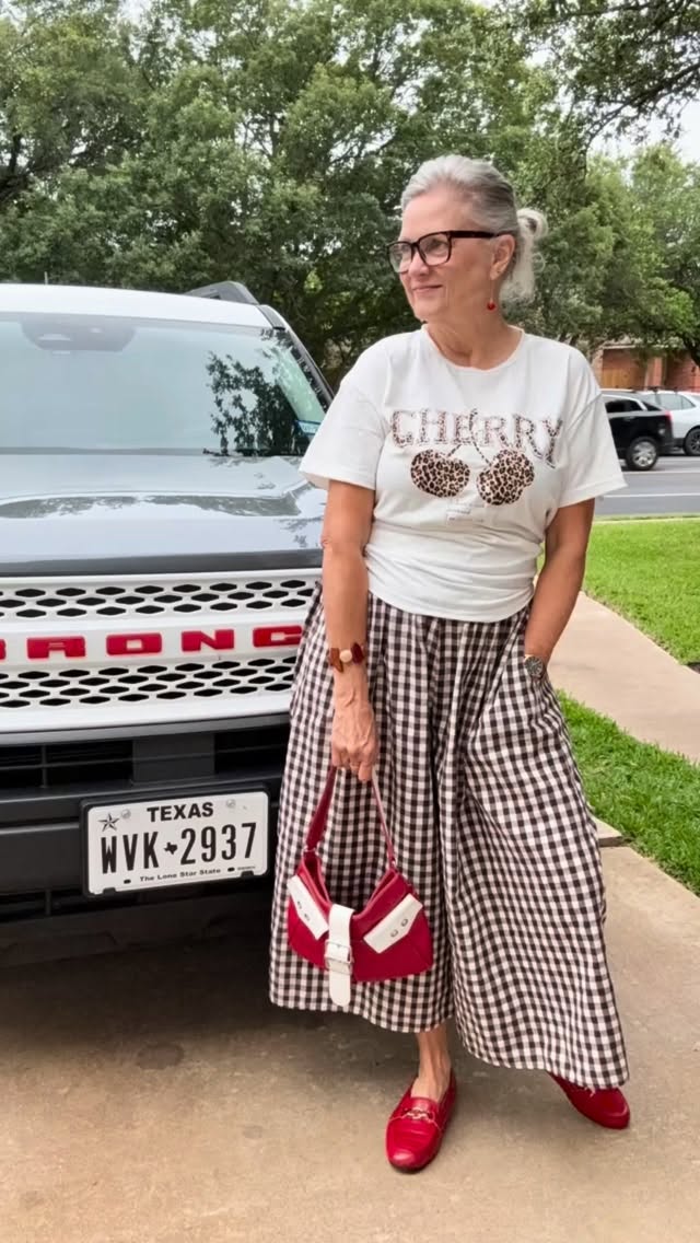 Cherry 🍒 red with brown gingham. Did you know that combo works? I’ll share the links in stories for the pants, the tee and the shoes! 👠. I barely made it up this morning - the sadness is heavy. But prayers from friends are lifting me up. And I’m grateful. #thymemag #imisshimsomuch