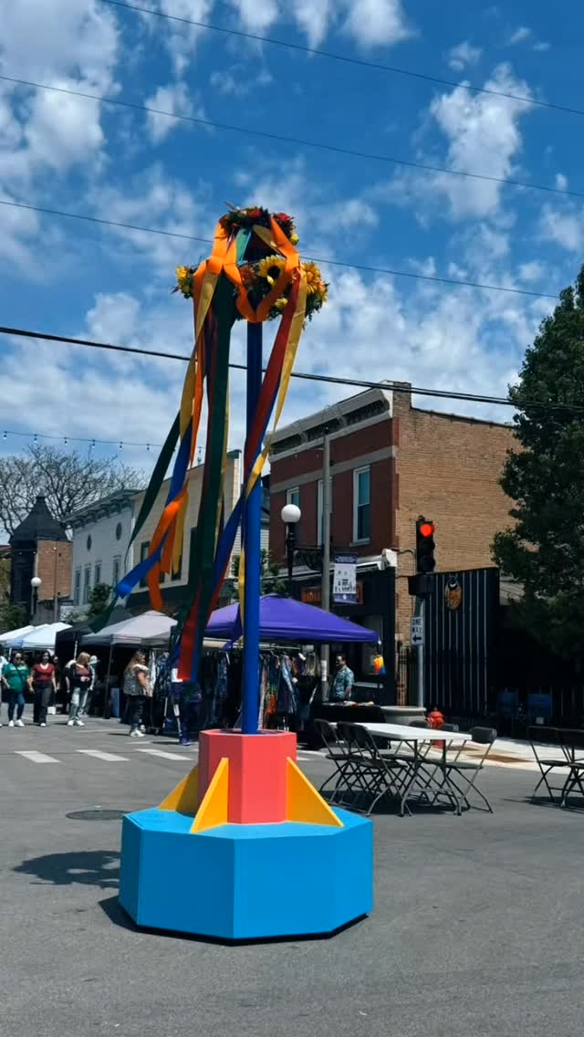 This Saturday, May 9, 2026, the streetz of Blue Island transform into a vibrant, music-filled, art-covered experience for the 5th Annual Mai Fest, running from 12pm to 5pm at the intersection of Olde Western Avenue and Broadway.
Set against the energy of Mother’s Day weekend, MAI FEST is more than a market—it’s a kickoff to festival season across Chicagoland.
Whether you’re bringing your mom, your crew, or just yourself, this is your invitation to wander, discover, and celebrate.
At the heart of it all are over 100 artisan vendors, each bringing their own voice, craft, and creativity. From handcrafted jewelry and original artwork to 3D prints, textiles, candles, woodwork, and everything in between, the lineup is stacked with talent. This is the kind of place where you don’t just shop—you connect, you discover, and you leave with something you didn’t know you needed until it was in your hands.
And the vibe? It’s carried by live music all day long. The Freightage Stage in the Gruppengarten keeps things moving with a stacked lineup—The Holdouts acoustic trio, Chicago kick things off from noon to 1:20pm, followed by Ms Sassy & The Blues Power Band bringing soul and energy from 1:40pm to 3pm, and Tone Zone Skam closing it out with a high-energy set from 3:20pm to 4:40pm. Roaming performances from Environmental Encroachment weave through the crowd from 1pm to 3pm, while DJ Ruta keeps the rhythm going near Jerry’s Jerky.
Come hungry, because the food and drink lineup is just as exciting. Local favorites like Rock Island Public House, Natural Law Bar & Grill and Blue Island Beer Company are pouring alongside a mix of street fest staples and standout eats—from Sid’s Pizza Calabrese, Jerrys Jerky and Pasta la Vista to Pollo Locuas Taco Cart Catering, El Cortez, Calabria, funnel cakes, and more. Whether you’re craving something savory, sweet, or ice-cold, you’ll find it here.
Getting there is easy, too. Parking is available at a remote lot at 2131 Fulton Street near the Vermont Street Metra Station, with free shuttles running throughout the day—or take the short four-block walk and soak in the neighborhood along the way.
Mai Fest 2026