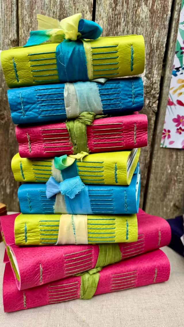 Preparing perhaps the most joyful gift box to leave the studio this season… 💙💚🩷
Three vibrant Hypatia Storyteller Journals in turquoise, lime, and fuchsia leathers – a bright and beautiful collection of creativity, inspiration, and possibility wrapped up together.
I love, imagining where these books may travel… perhaps summer journals for sisters or dear friends, gifts for graduates beginning new adventures, memory keepers for a family trip, or simply beautiful companions for sketching, dreaming, writing, painting, and gathering life along the way.
There is something so inspiring about opening a bright, handmade, leather journal filled with beautiful papers that invite you to create, reflect, wander, and remember.
A Hypatia Storyteller handmade journal makes a meaningful gift for artists, writers, travelers, gardeners, dreamers, graduates, mothers, daughters, and anyone longing to reconnect with creativity and the beauty of the handmade.