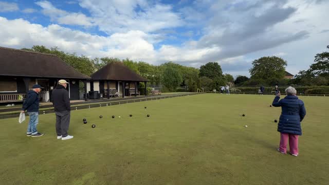 Wednesday social evening: whatever the weather! This was the moment it stopped raining or hailing briefly. Called it a day after 10 ends to warm up with a glass of wine. #lawnbowlsforlife #parliamenthillbowlsclub #thatshowweroll #hampsteadheath #parliamenthill