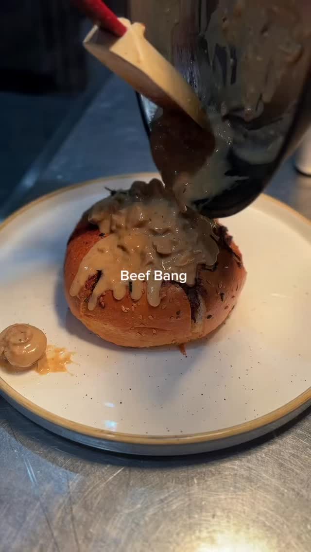 Bang!Bang ! Bang! Say hello to our new Autumn dish Beef Bang! We took tender stew beef, smothered it in our signature herb mushroom sauce, added sour cream and a generous layer of mozzarella cheese, and packed it all into a soft brioche bun.
It‘s a flavor explosion you don’t want to miss. Who are you bringing with you to crush this?
#BeefBang #GourmetBurger #ComfortFood #FoodPorn #CheesePull BriocheBun StewBeef MushroomSauce InstaFood FoodieGram BurgerLovers Delish CheatMeal