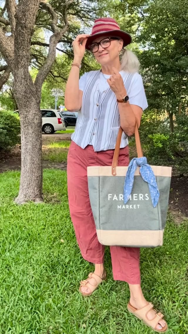 My husband and I went to markets 🥬almost every weekend, and doing all of the things I did with him for the first time is so painful. But then I think it will become joyful as I remember the good 😊 times. I’m hoping… This is my favorite market tote, and I see that @marshalls has them again this year. The hat 👒 is for the baseball ⚾️ game later. And the whole look of casual summer pants with a white tee from @onequince and a striped vest feels just like a Saturday at the markets vibe. What are you doing today?#thymemag #imisshim #saturdaymarket
