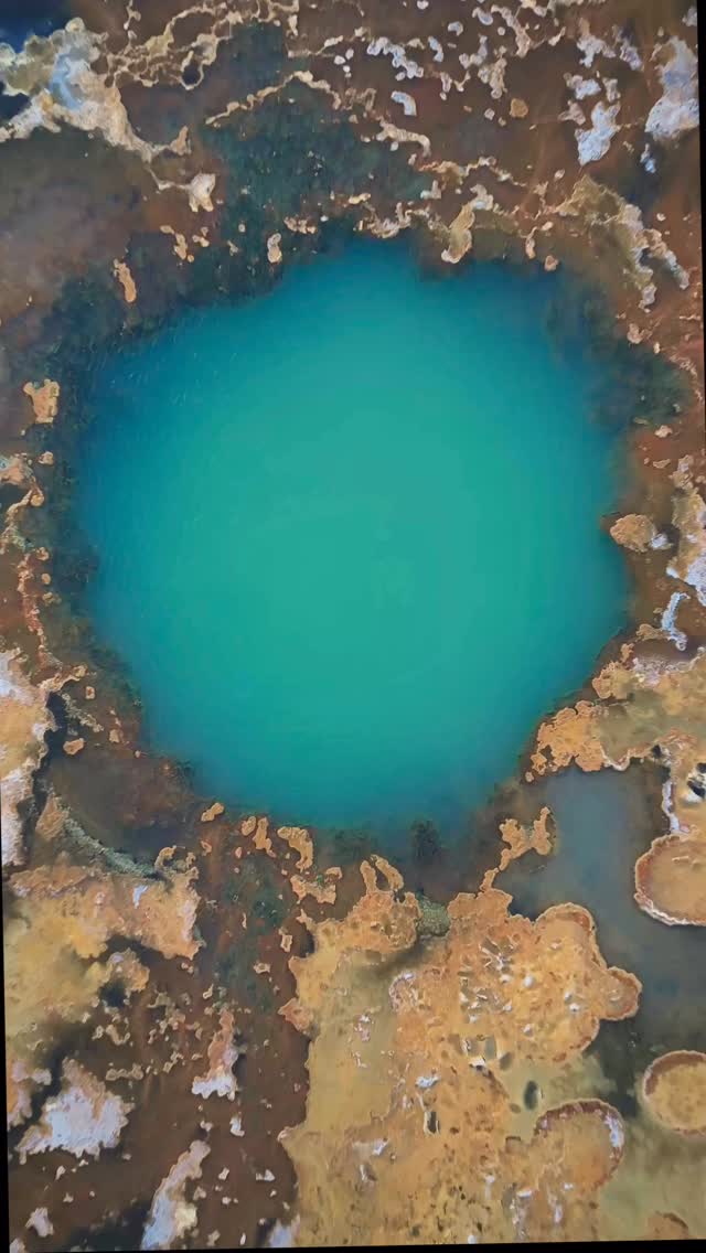 Found a massive hole in the drying up of the Great Salt Lake that captivated my curiosity. The minerals oxidizing once they flow onto the surface turn into crazy colors and textures.