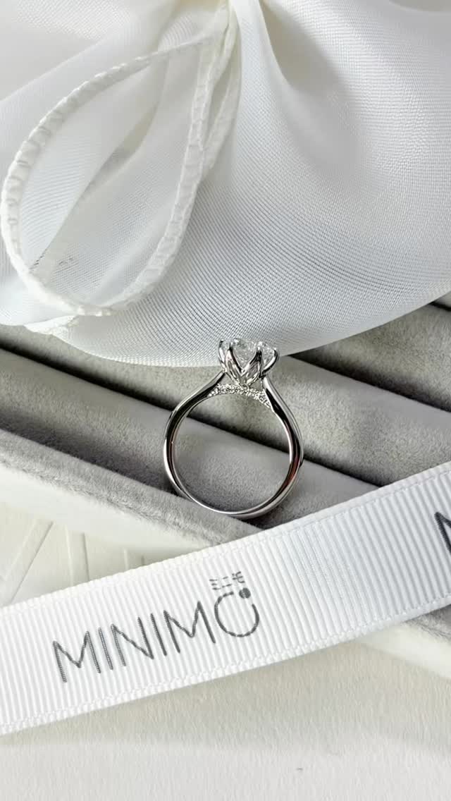 งานสั่งทำแหวนแต่งงานเพชรชู GIA 1.20กะรัต น้ำ100 D color • Solitaire Ring with Petal Prongs and Hidden Accent Bridge • 18K White Gold ✨💍
.
Budget : 1xx,xxx THB +/-
.
ลูกค้าที่สนใจแวะมาชมสินค้า รบกวนนัดหมายล่วงหน้าก่อนนิดนึงนะครับ ☺️
.
ตัวเรือนทองแท้ พร้อมเพชรใบเซอร์ GIA สำหรับขนาด 0.18 กะรัตขึ้นไปทุกเม็ด
.
มีหน้าร้าน พร้อมบริการหลังการขายทุกเรื่อง ดูแลลูกค้ามาแล้วกว่าสามพันคู่ ชมรีวิวจากลูกค้าได้ที่ >> https://www.minimojewelry.com/testimonial
.
ดูแบบแหวนทั้งหมดได้ที่ —> https://www.minimojewelry.com/weddingringsdesign
.
** แถมฟรี เลเซอร์สลักชื่อ เลือก Font ที่ชอบได้
** พร้อมกล่องแหวนสวยๆสำหรับเข้าพิธี
.
💎 Inbox: m.me/minimo.jewelry
💎 Line: @minimo.jewelry (มี @)
💎 Web: http://minimojewelry.com
💎 Call: 092-456-9509
.
** เนื่องจากงานของทางร้านเป็นงานสั่งทำตามความต้องการของลูกค้า ราคาจึงอาจมีการปรับเปลี่ยนตามดีไซน์ สเปคเพชร ไซส์แหวน และราคาทอง/เพชร ในแต่ละช่วงเวลาครับ
.
#minimojewelry #แหวนคู่ #แหวนแต่งงาน #แหวนเพชร #แหวนหมั้น diamond diamondring แหวนเพชรแท้ เพชรGIA engagementring ทองแท้ เพชรแท้ weddingring เพชรแท้ราคาโรงงาน แหวนเพ�