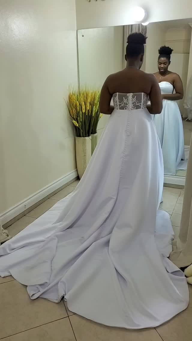 Some moments are priceless...
Monique's energy is EVERYTHING! We hadn't even finished sewing on the pearls to her #skintone sleeve or added the snaps to connect the lace top to the bodice of the dress, but this moment was the culmination of everything — watching her vision come to life through meaningful partnership.