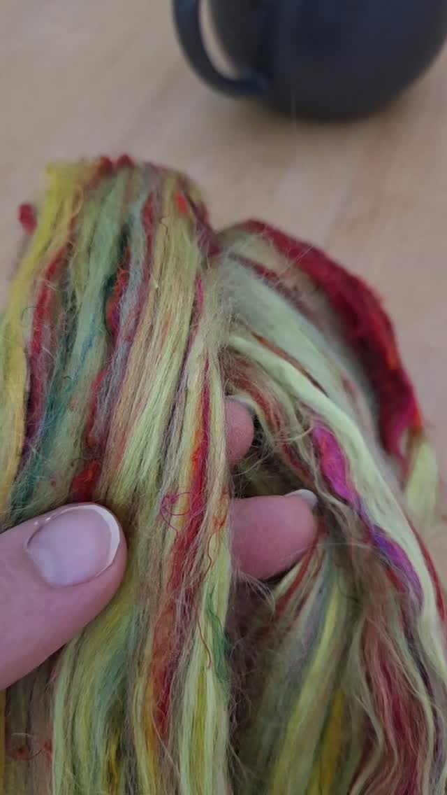I recently got a new blend of Merino, silk, and bamboo from #worldofwool just to experiment with the fiber types. But once that first single ply hit the bobbin... I wasn't in love. It was too thick-and-thin, full of wild texture, and the high-contrast red and green felt a little too "noisy" and vibrant for my personal wardrobe. 😑
Instead of letting it sit in hibernation, I decided to treat it as a design challenge 🤩 I mixed two different companion plies to calm that noisy single down to just 30% of the finished yarn:
✨ Option 1 (The Cool Teal): Blended with Teal and silver to cool down the vibrant green. It added a gorgeous, rich color depth—colorful, but sophisticated.
✨ Option 2 (The True Yellow-Green): Kept the colors true to the original yellow-green base but omitted the high-shine silk. It calmed down the texture and kept the true color palette.
Now that they are both plied up... I genuinely love them both 🥰😍
Help me decide which direction to take for the final project. Are you team Cool Teal 💙 or team True Yellow-Green 💚?
Drop your vote in the comments! 👇
#makerjourney #spinning #spinningyarn #intentionalspinning