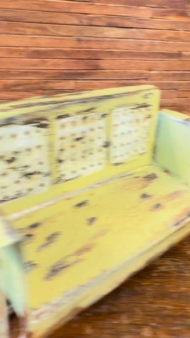 Dollhouse miniature 1:12 scale version of the classic mid-century modern porch glider by unknown maker measuring just about 6 inches long made real metal with movable parts, aged weathered and rusty over a classic yellow color is available now in my latest estate auction there's a link in my bio to shop now bidding and Sunday during the 7pm ET hour #midcenturyfurniture #gardenstyle #mcmdesign #miniature