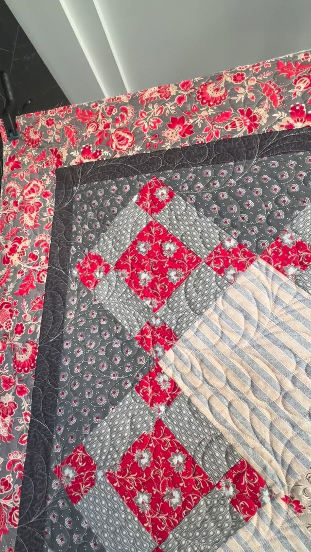 ✨ There’s just something timeless about a quilt that combines soft florals, classic patchwork, and beautiful quilting texture. This stunning quilt was pieced by my talented client Jenne and brought to life with the elegant Abundant Feathers longarm quilting design. The flowing feather motifs add movement, texture, and a touch of heirloom charm that perfectly complements these gorgeous red, cream, and gray fabrics.
One of my favorite parts of longarm quilting is helping each quilt tell its story through texture. Watching the quilting enhance every block, border, and fabric choice is always such a rewarding part of the process.
If you’ve finished a quilt top and are looking for a professional longarm quilter, I’d love to help transform your quilt into a finished treasure. I proudly offer longarm quilting services in St. George, Utah, and work with quilters throughout Washington, Santa Clara, Ivins, and Mesquite, as well as mail-in quilting clients nationwide.
💕 Quilt pieced by Jenne
🪡 Longarm quilted by OMJ Longarm Quilting
✨ Quilting design: Abundant Feathers
Are you a feather quilting fan, or do you prefer modern geometric quilting designs?
#LongarmQuilting #omjquilting #frenchgeneral #StGeorgeUtah #longarmquilter